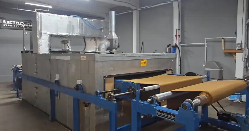 Stenter frame machine at Metro Dyeing facility